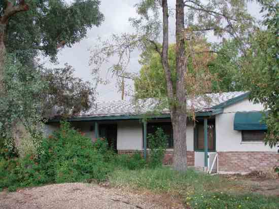 This 1960s tract house needs efficiency upgrades.